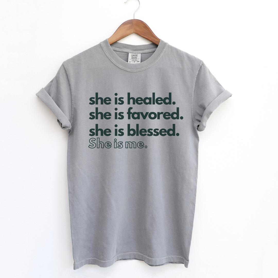 Empowering affirmation product with text 'She is Healed, She is Favored, She is Blessed, She is Me.' A statement of self-worth and faith."