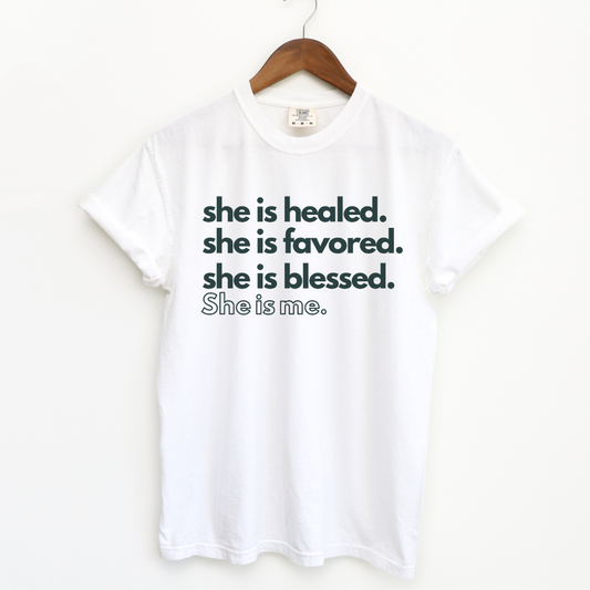 Empowering affirmation product with text 'She is Healed, She is Favored, She is Blessed, She is Me.' A statement of self-worth and faith."